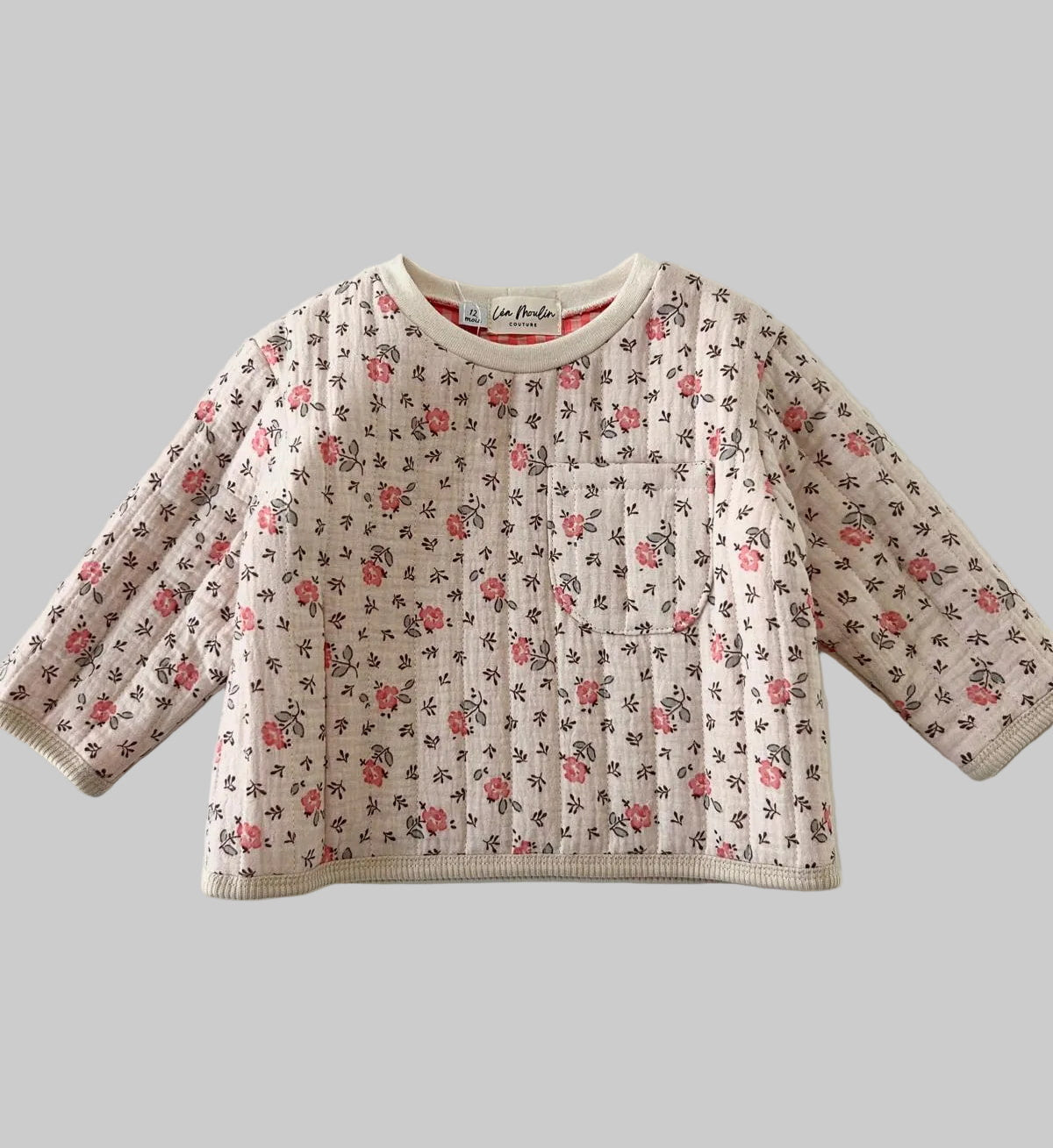 Sweat bébé fille Margaux en coton matelassé fleuri rose, col rond, manches longues et poche plaquée