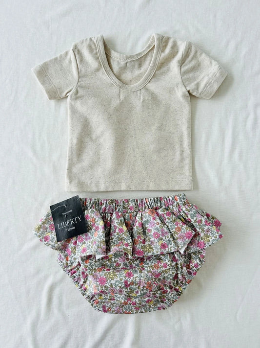 T-shirt bébé beige dos nu style danseuse avec nœud Liberty.