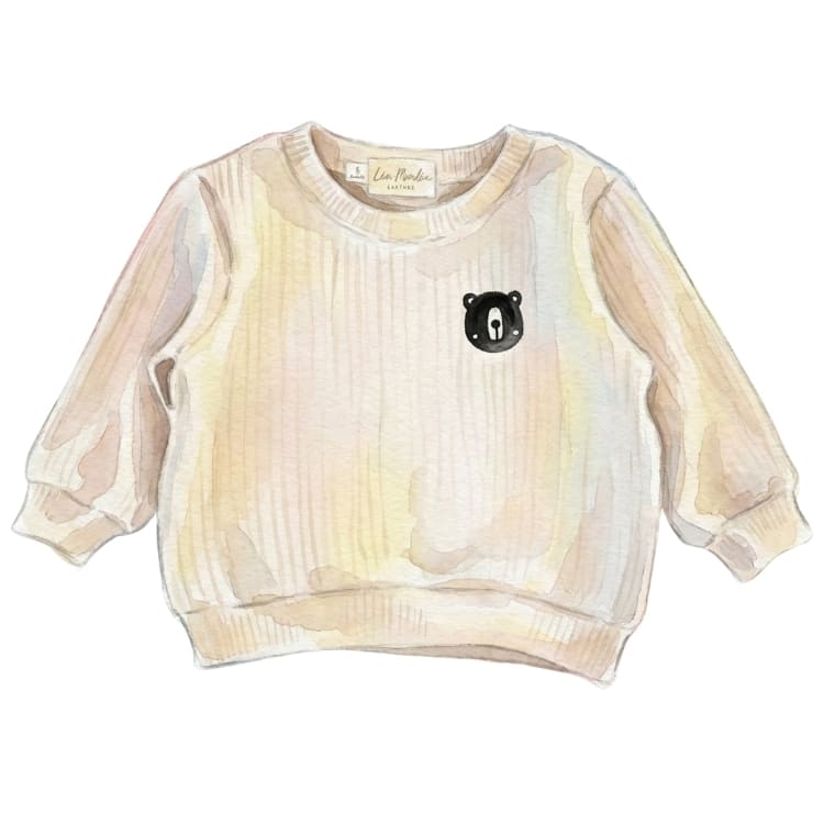 ébé portant un gilet en tricot et une blouse artisanale - Collection Hauts et Chemises Léa Moulin Couture