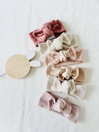 Bandeau bébé fille évolutif avec nœud ajustable modèle Manon.