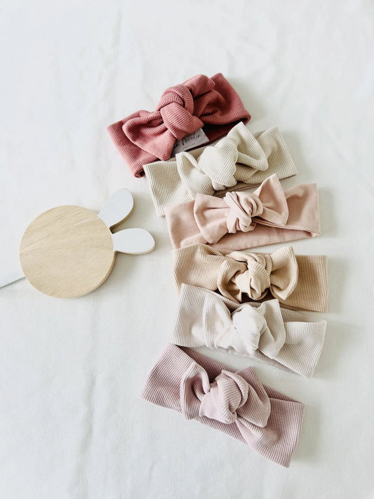 Bandeau bébé fille évolutif avec nœud ajustable modèle Manon.