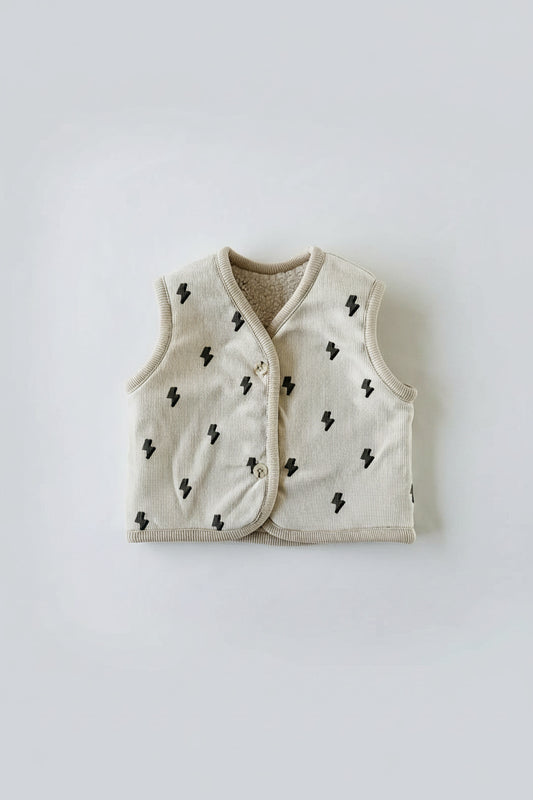 Gilet bébé mixte réversible, vu côté sherpa écru moelleux, fermeture par boutons