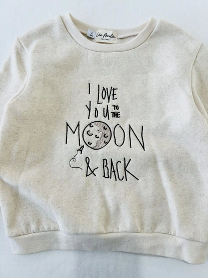Détail de la broderie lune sur le sweat bébé en coton et lin chiné