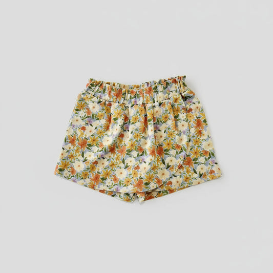 Jupe-culotte bébé en viscose et lin fleuri, coupe portefeuille et taille élastique, vue de face