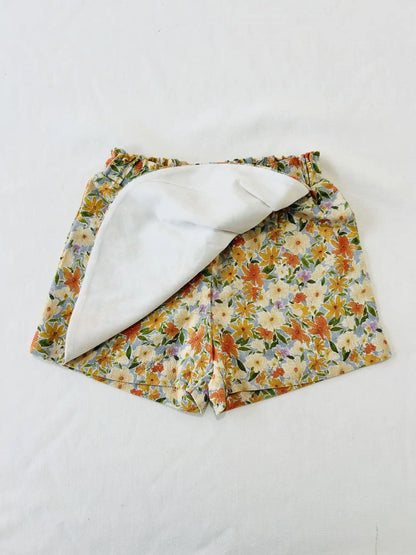 Doublure intérieure blanche de la jupe-culotte bébé fille en viscose et lin fleuri Agathe