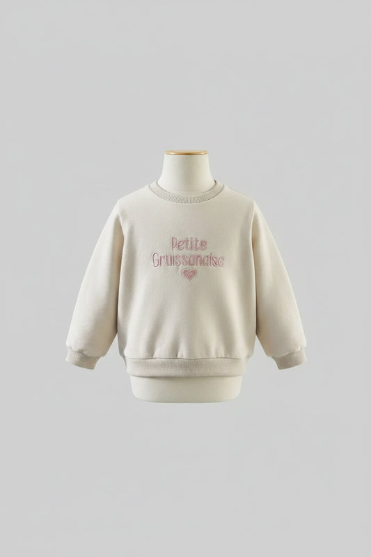 Sweat bébé beige doublé polaire, brodé « Petite Gruissanaise » en rose