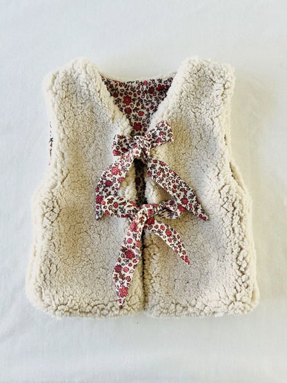 Veste sans manches chaude réversible côté sherpa écru.