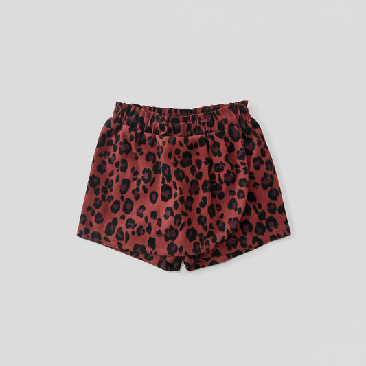 Jupe-culotte bébé fille imprimé léopard en velours côtelé rouge brique, vue de face